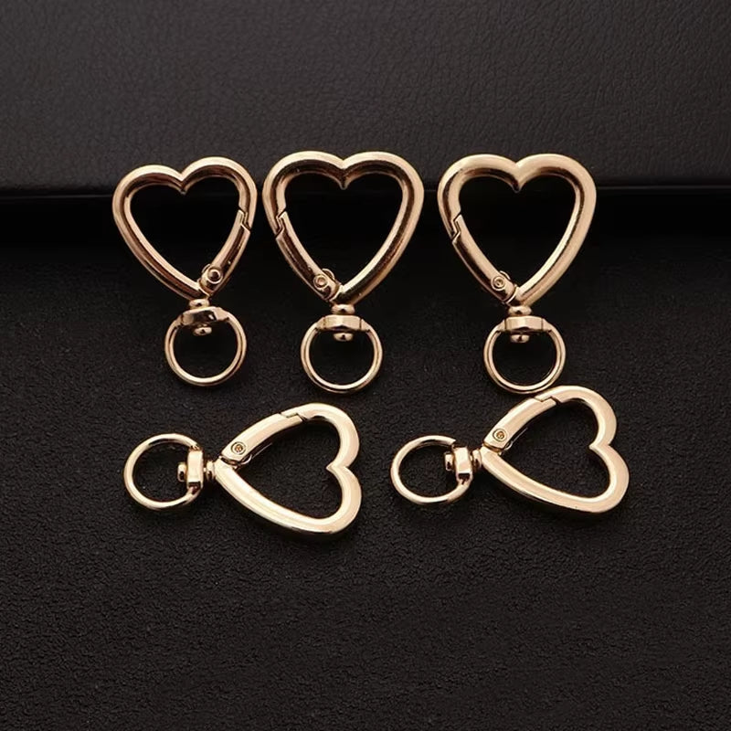 Mosquetón Giratorio Dorado Forma Corazon - 50 Unid.