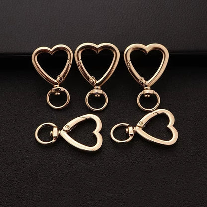 Mosquetón Giratorio Dorado Forma Corazon - 50 Unid.