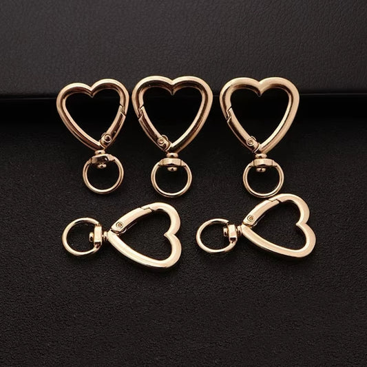 Mosquetón Giratorio Dorado Forma Corazon - 50 Unid.