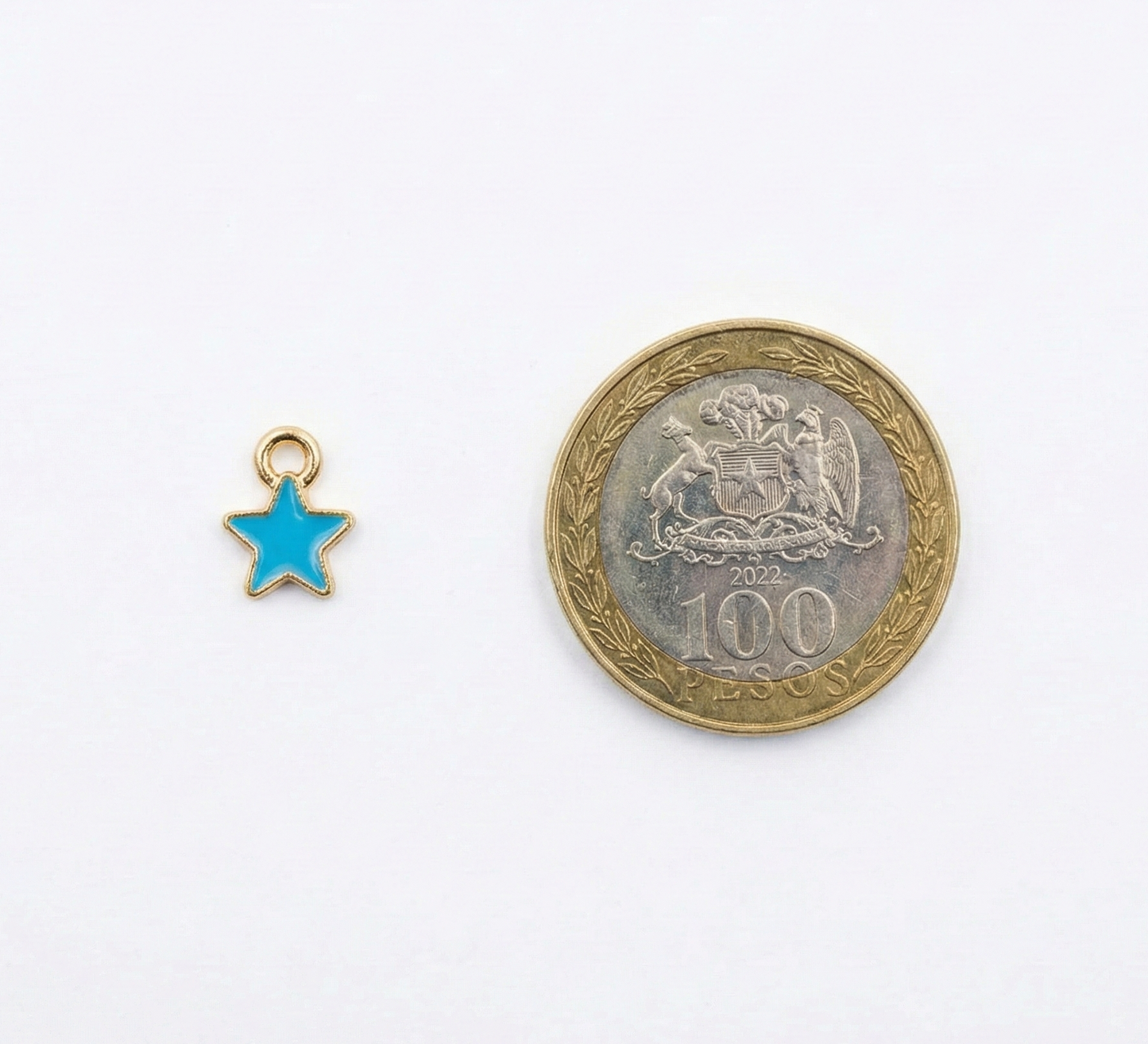 Dije Estrella Chica Celeste 6x9mm