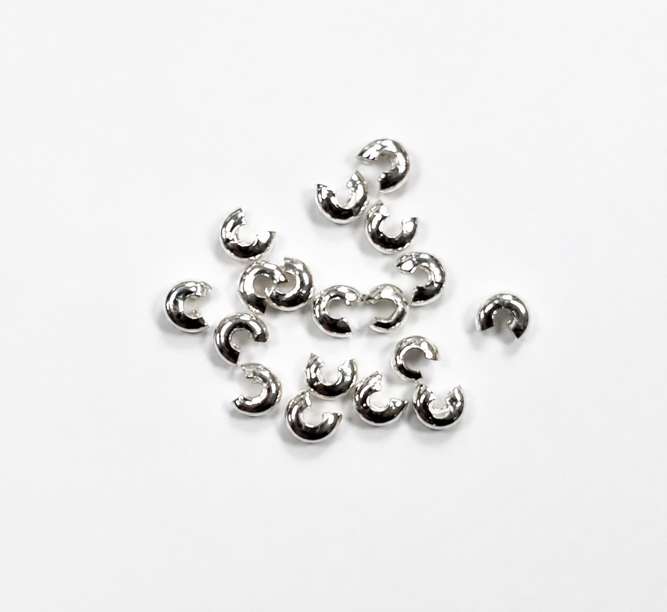 TAPANUDO CARACOL NIQUELADO FANTASIA 4mm - 100pcs