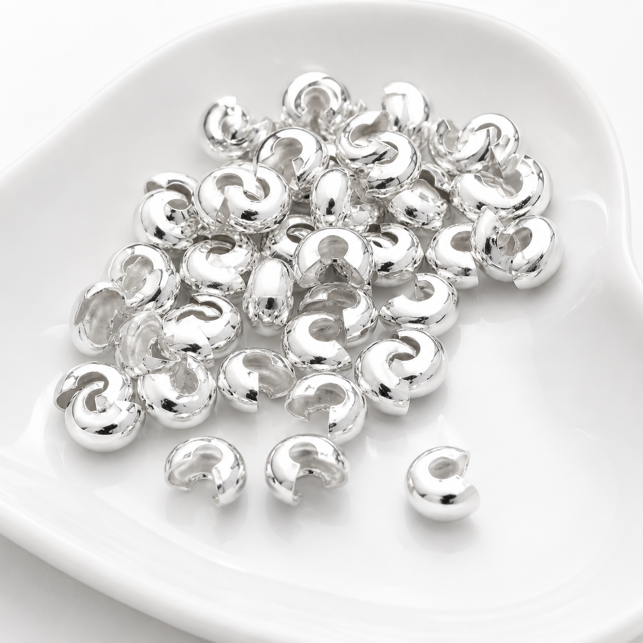 TAPANUDO CARACOL PLATEADO FANTASIA 4mm - 100pcs