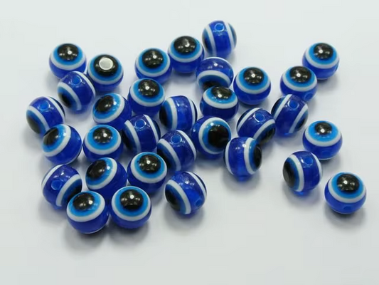 Ojos Turcos Azul de Plástico - 100 Unid.