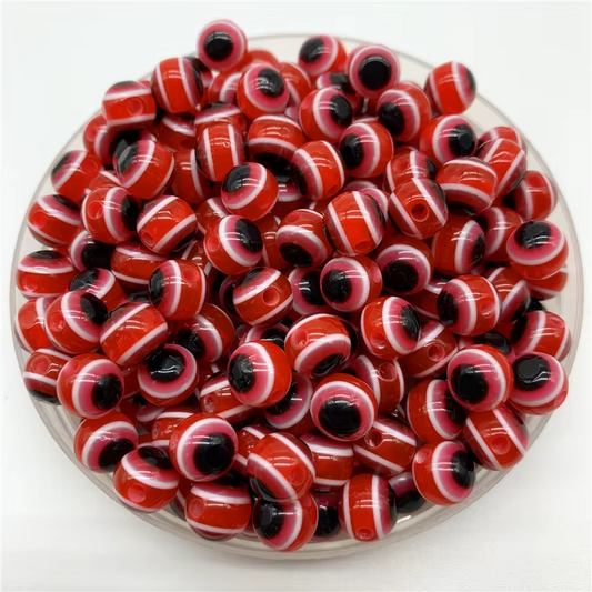 Ojos Turcos Rojos de Plástico - 100 Unid.